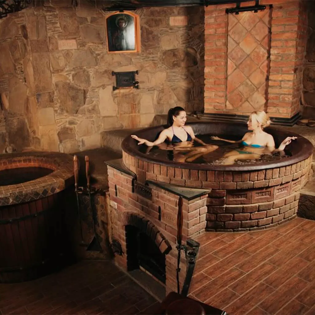 2 girls are soaring in spa hot tub