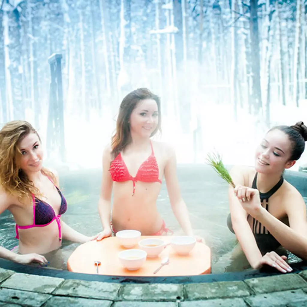 3 girls in hot iron tub in winter