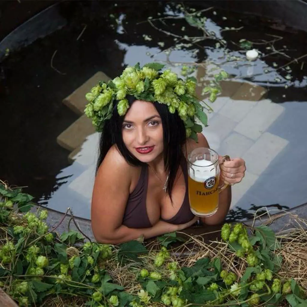 girl and beer in hot tub bathtub