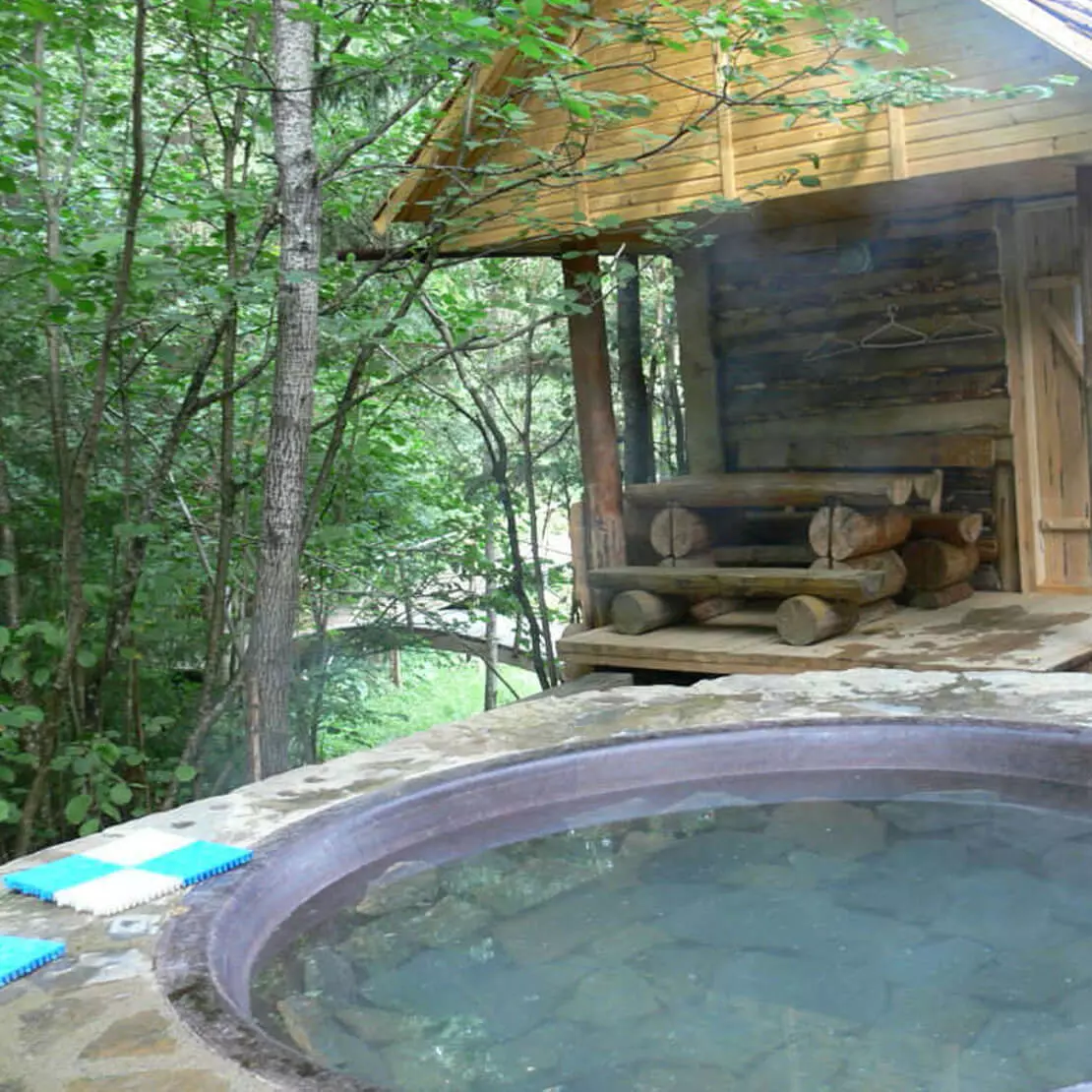 off grid hot tub in the forest
