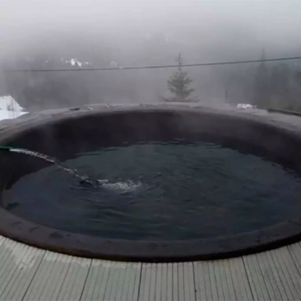 outdoor tub in the fog mountains