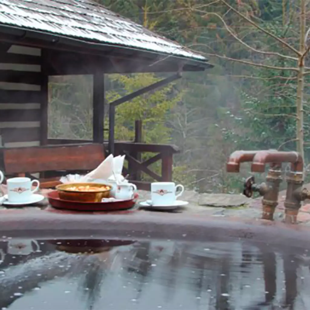 tea ceremony in traditional hot iron tub